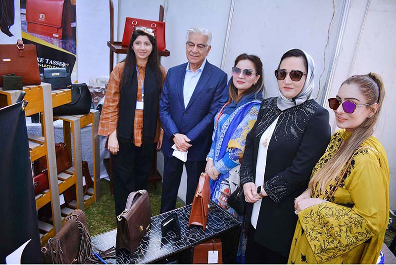 Federal Minister for Defence Khawaja Muhammad Asif visiting different stalls at the exhibition
