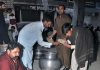 Volunteers distributing food for iftar in the Federal Capital