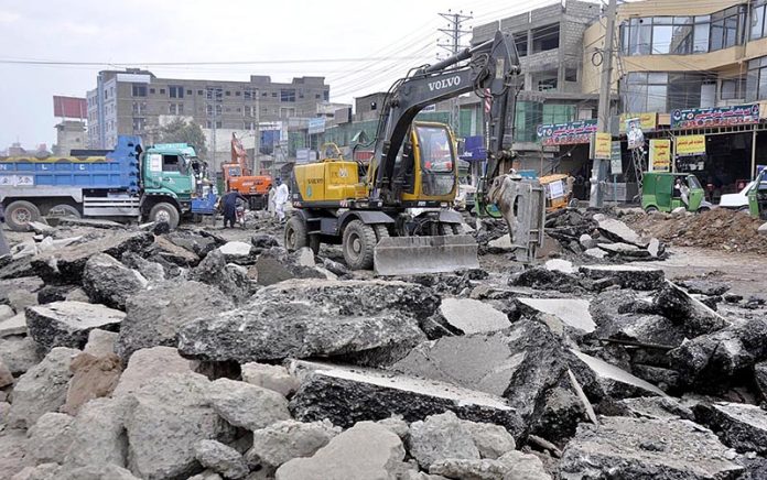 Heavy machinery is being used during construction work of IJP Road as development work in the city
