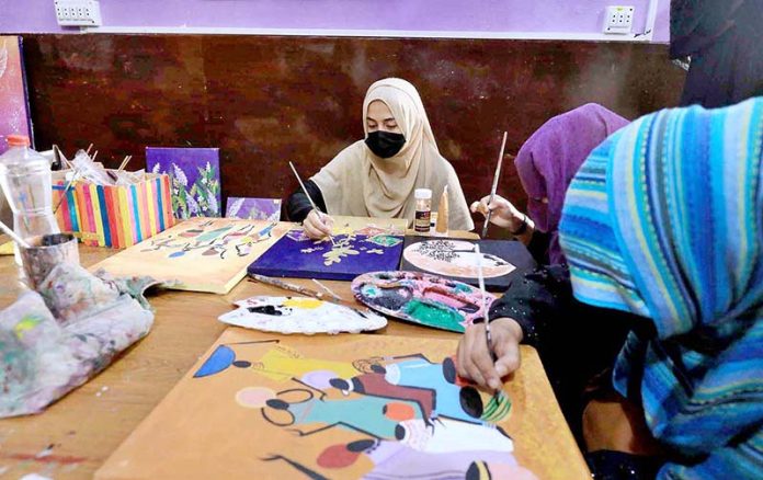 Students painting art in a class at Sana Skill Academy Centre at the Board Tajabad area