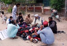 Some people are buying caps from roadside during the holy month of Ramadan