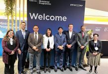 Federal Minister for IT and Telecommunication Syed Amin Ul Haque in a group photo after meeting with GSMA delegation on the sidelines of Mobile World Congress (MWC)