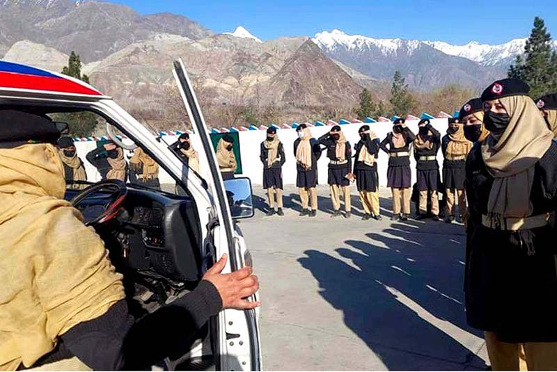 Ladies Police driving trainer giving instruction to police personnel during the training session