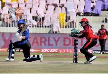 Women cricket players in action during a 2nd cricket exhibition match at Rawalpindi Cricket Stadium to mark the International Women's Day