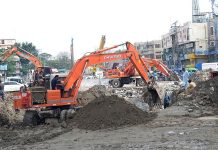 Construction work underway as heavy machinery being used in underpass of Samanabad in Provincial Capital