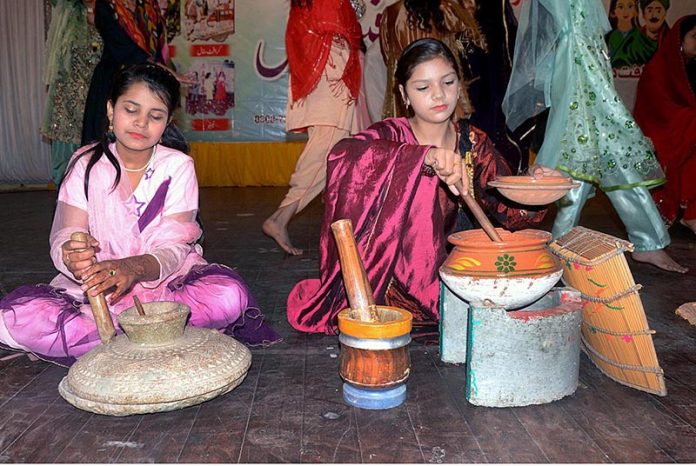 Students performing on the stage during Punjab Culture festival at Arts Council