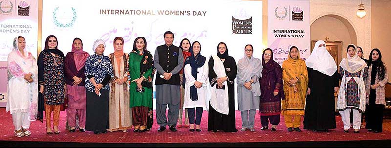 Speaker National Assembly Raja Pervez Ashraf in a group photo with the participants of International Women’s Day celebration organized by Women Parliamentary Caucus