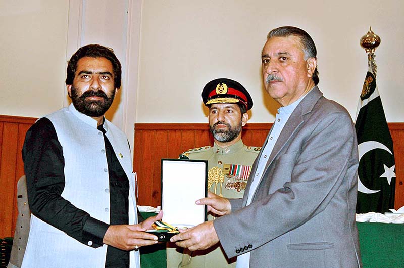 <em>Governor Balochistan Malik Abdul Wali Kakar conferring Presidential and Excellence Awards on various personalities for their outstanding performance and best services during a ceremony on Pakistan Day held at Governor House</em>