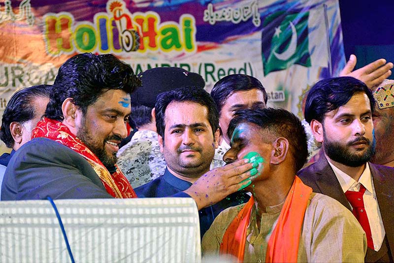 Governor Sindh Kamran Tessori celebrating with Hindu community during Holi festival of colors at Durga Shiv Mandir