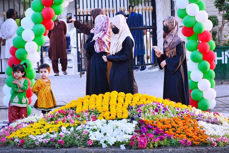 Women and children visiting flowers exhibition during three days jashan-e-baharan flowers show at Shaheed e Millat Park
