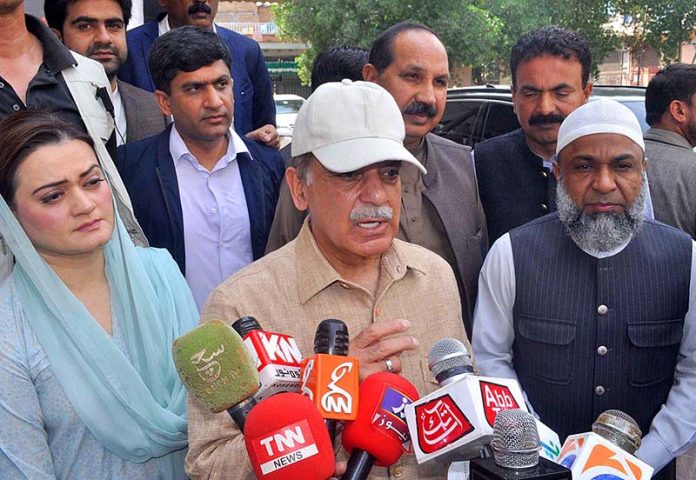 Prime Minister Muhammad Shehbaz Sharif talking to media persons after visiting Free Flour Distribution Points established as part of Prime Minister’s Ramzan Relief Package for deserving families