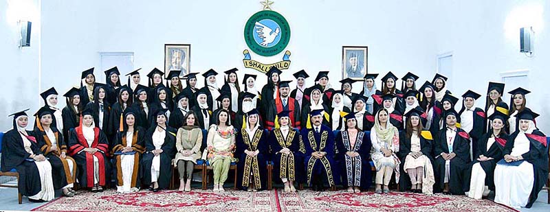 First Lady Begum Samina Alvi in a group photo with the faculty and distinction-holder graduates at the 30th Convocation of the Fazaia Bilquis College of Education for Women Pakistan Air Force (PAF) Nur Khan