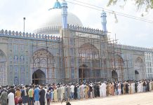 People offering first Namaz-e-Jumma at Shahi Eid Gah Masjid during Holy Fasting Month of Ramzan ul Mubarak