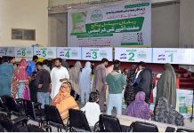 A view of distribution of free flour bags by the Prime Minister of Pakistan for the needy people ahead of the holy month of Ramzan at Centre Anwaar Club