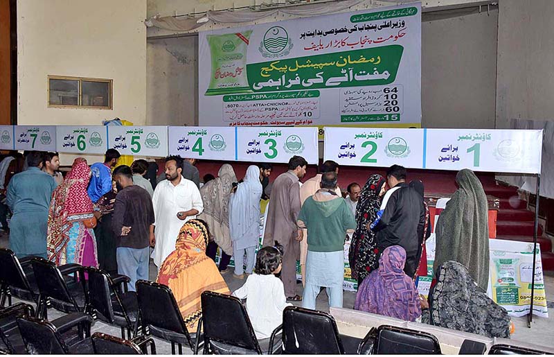 A view of distribution of free flour bags by the Prime Minister of Pakistan for the needy people ahead of the holy month of Ramzan at Centre Anwaar Club