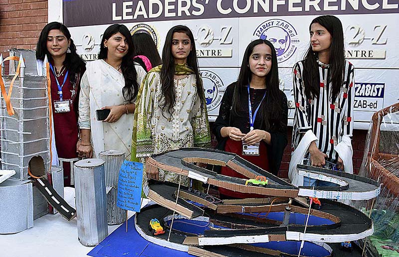 Students standing with their project of Science during Sinence ,Art & Craft Exhibition 2023 at SZABIST School and Intermediate College Sachal Colony