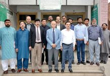 Group photo of officers of AG Office with Associate Advisor to Regional Secretariat Federal Ombudsman Faisalabad Syed Ghazanfar Mehdi during his visit to Accountant General (AG) Office Faisalabad