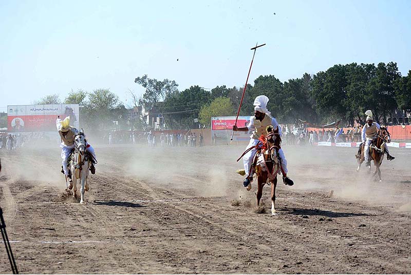 Players participating in tent pegging championship arranged by University of Agriculture Faisalabad (UAF) at Sports Ground in connection with Spring Festival celebrations