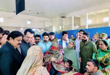 central Leader of Pakistan Muslim League-N (PML-N) Muhammad Talal Chaudhary inspecting the Free Flour Distribution Center at Jaranwala