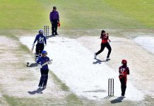 Women cricket players in action during a cricket exhibition match at Rawalpindi Cricket Stadium to mark the International Women's Day