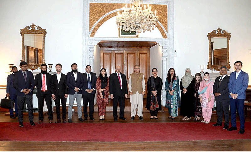 President Dr. Arif Alvi in a group photograph with delegation of PhD students at Governor House