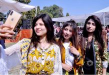 Students taking selfie at the Opening Ceremony of Higher Education Commission Sports Gala at University of Sargodha