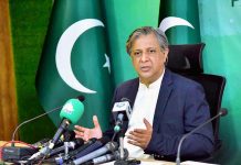 Federal Minister for Law and Justice, Senator Azam Nazeer Tarar addressing a press conference