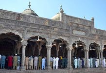 People offering first Namaz-e-Jumma at Historical Badshai Masjid during Holy Fasting Month of Ramzan ul Mubarak