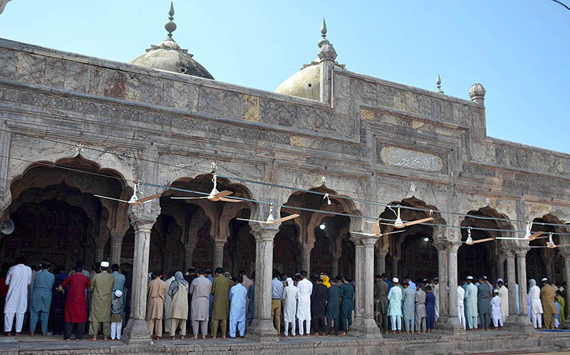 People offering first Namaz-e-Jumma at Historical Badshai Masjid during Holy Fasting Month of Ramzan ul Mubarak