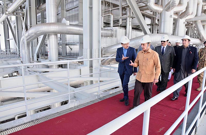 Prime Minister Muhammad Shehbaz Sharif visiting Shanghai Electric Power Plant site. Prime Minister was briefed about the boilers, cooling towers and supply chain of coal form the Thar Block 1 mine in Thar