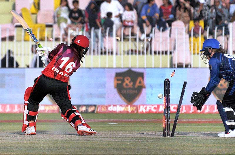 Women cricket players in action during a 2nd cricket exhibition match at Rawalpindi Cricket Stadium to mark the International Women's Day