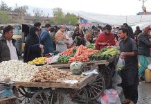 People buying vegetables at Joint Road