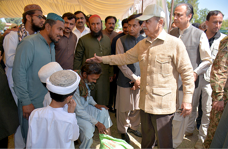 Prime Minister Muhammad Shehbaz Sharif visiting free flour distribution point established as part of Prime Minister's Ramzan Relief Package for deserving families