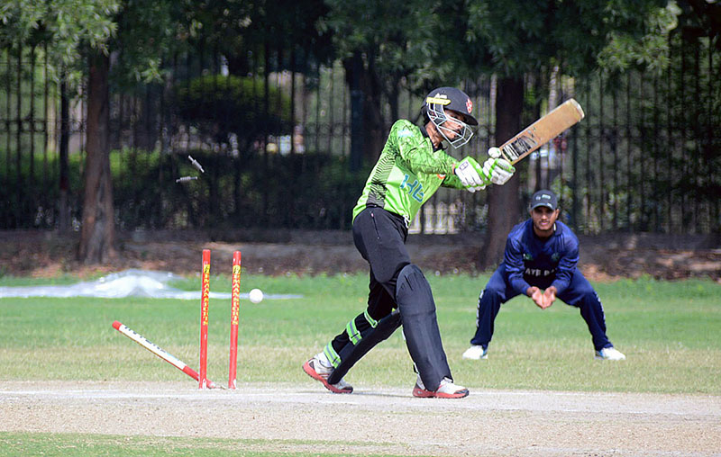 Cricket players in full action during cricket match played between State Bank and Habib Bank Limited teams for State Bank Governor Cup 2023 at Bohranwali Ground