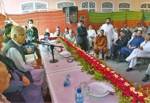 Defense Minister Khawaja Muhammad Asif addressing the PML-N workers at Hunterpura