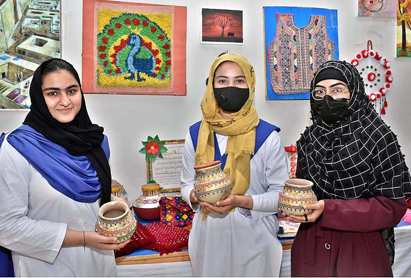 Students with their art projects to participate in Science, Art & Craft Exhibition 2023 during 1st Sindh College Talent Hunt event at Begum Nusrat Bhutto Government Girls Degree College