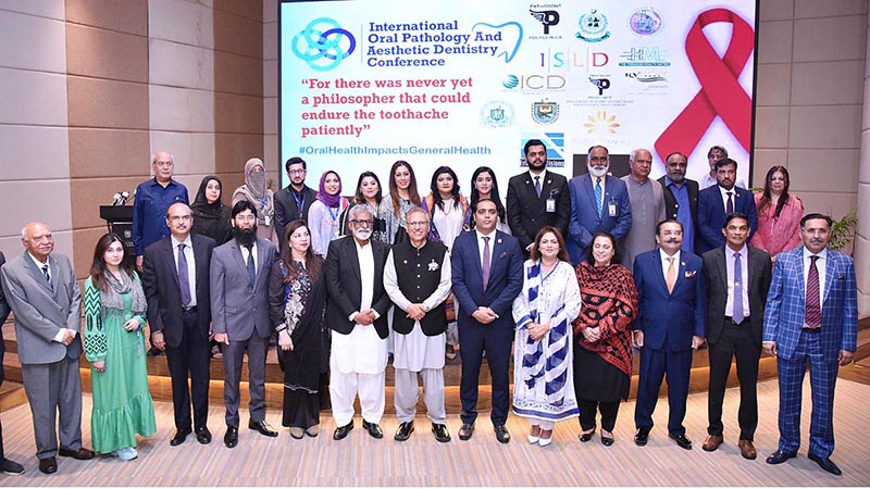 President Dr Arif Alvi in a group photo with the participants and speakers of the 2nd Annual Conference of Pakistan Society of Oral and Maxillofacial Pathology