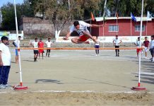 Students are participating in high jump competition during the annual competitions of Government Graduate College Attock