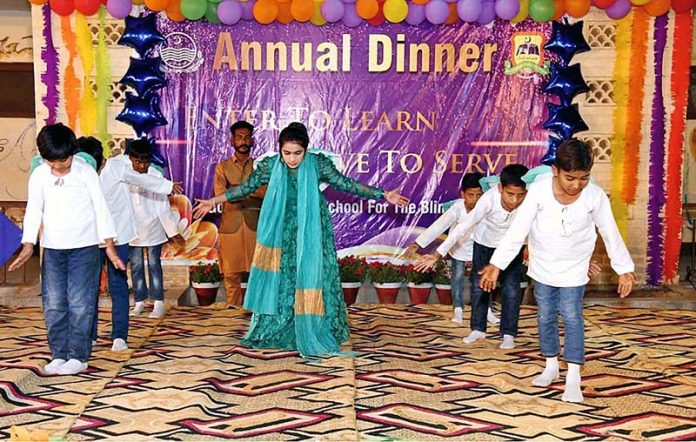 Blind, special children are presenting a tableau on the Culture Day organized by Government Secondary School for
