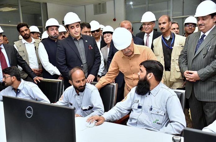 Prime Minister Muhammad Shehbaz Sharif interacts with the engineers working at the 330MW Thai Nova Electric Power Plant Site