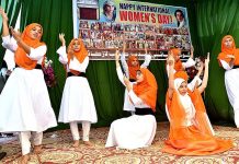 Students performing dance in a tableau during a function in connection with upcoming International Women Day at Gomi Bai Ladies Club