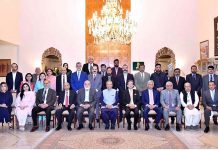 President Dr. Arif Alvi in a group photo with the organizers and speakers of the awareness seminar on "Digital System for Public Welfare: Weaknesses and Remedies", at Aiwan-e-Sadr