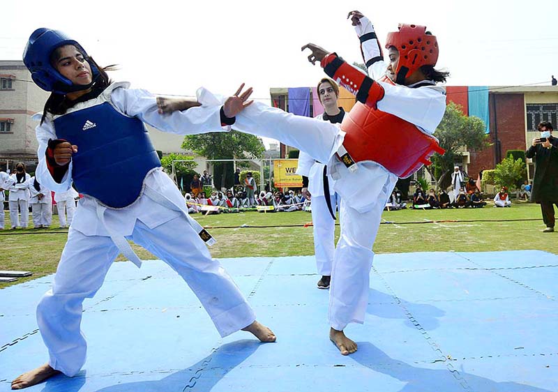 Students participating in Tug Of War competition during Jashn-e-Baharan Sports Festival at Government City Girls College