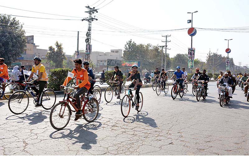 Deputy Commissioner Ali Annan Qamar reaching Iqbal Stadium by riding his bicycle in connection with the Jashan Baharan celebrations organized by the district administration
