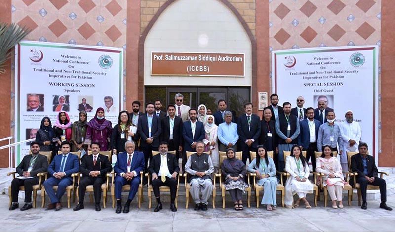 President Dr. Arif Alvi in a group photo with the participants of the conference titled '' Traditional and Non Traditional Security Imperatives for Pakistan