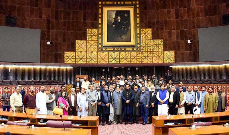 Speaker National Assembly Raja Pervez Ashraf in a group photo with Rawalpindi Union of Journalist (RUJ) in Parliament House