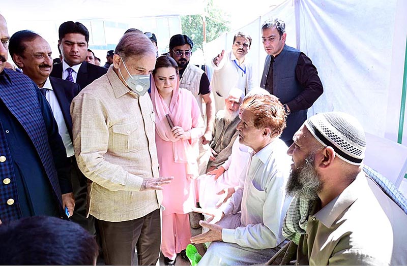 Prime Minister Muhammad Shehbaz Sharif visits free flour distribution points established under PM's Ramzan Package for deserving families