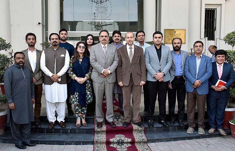 A group photo of Georg Steiner, Ambassador of Switzerland to Pakistan and President SCCI Abdul Ghafor Malik with Chamber of Commerce members during his visit