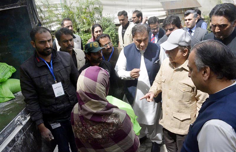 Prime Minister Muhammad Shehbaz Sharif distributes free Atta (Flour) among the beneficiaries of Free Atta Scheme