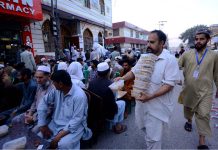 Affluent people of the city are arranging food for breaking fast on Iftar time for deserving people near the old emergency gate of Lady Reading Hospital